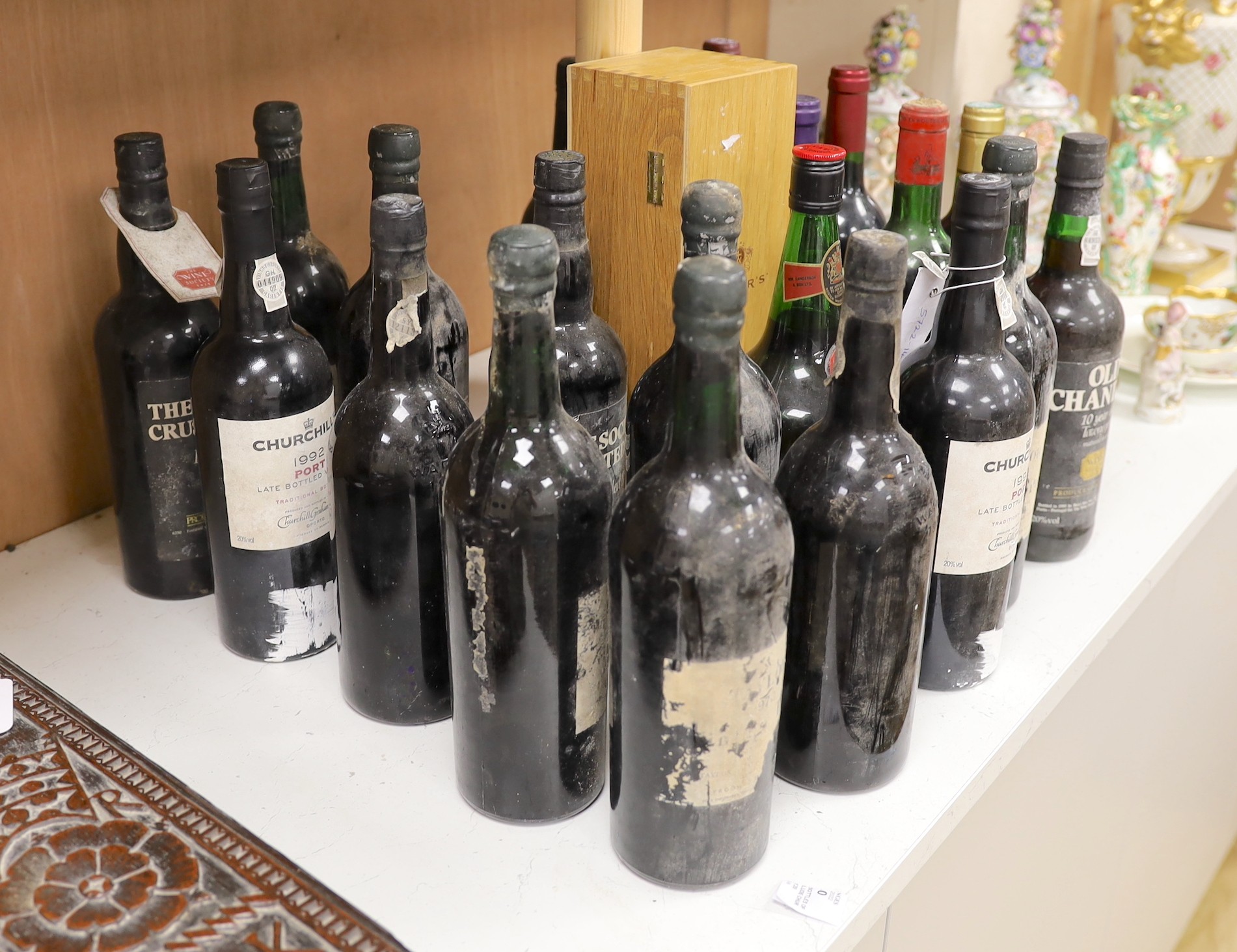 Six various bottles of wine including Croz Hermitage, Saint Julien, Chateau Beychevelle etc. and 16 bottles of port, mostly Taylor’s, varying vintages.